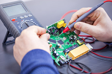 Technician repairs electronics