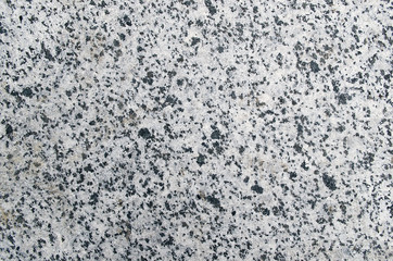 Natural stone gray granite background with untreated surface har