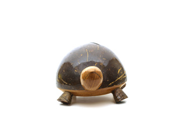 wooden turtle box bank with white background. isolated