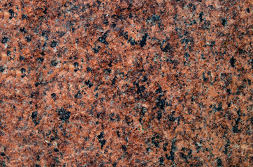 Natural stone granite background with bright hard rock texture
