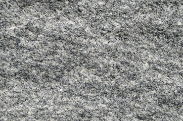 Natural stone gray granite background with untreated surface har