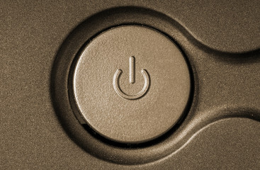 Power button in sepia. Standby-button in in gray with a grainy texture.