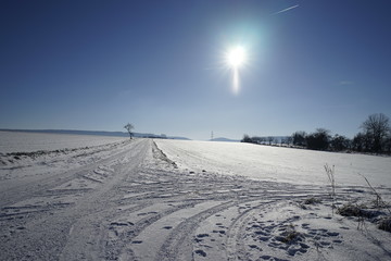 Sunny winter landscape view with blue sky
