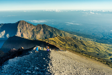 Crater Hiking. View of the sandy path along the crater rim of volcano "Gunung Rinjani", Lombok, Indonesia. Taken after a hike to the summit.