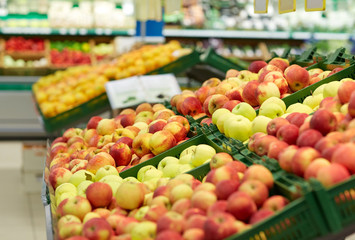 ripe apples at grocery store or market