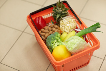 food basket on grocery or supermarket floor