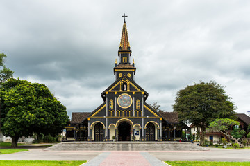 Church of Kon Tum. Historical wooden church in Kon Tum, Vietnam. Built during the French...