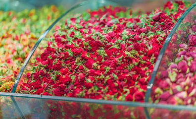 Tea from dry rose buds, healthy herbal tea in show case at grand bazaar market in Istanbul, Turkey.