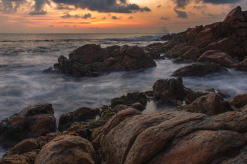 beach sunset long exposure beautiful shore rocks coral waves water ocean
