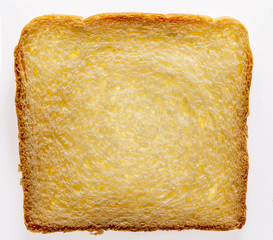 A slice of white bread. Texture.
