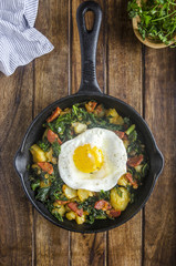 Chorizo and kale hash with an egg