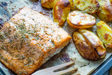 Grilled Fillet of Salmon with Baked Potato and Red Paprika Sauce, Horizontal View