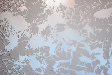 The sun is shining through the frosted glass