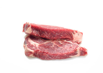 Raw marbled beef on a a white background