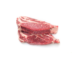 Raw marbled beef on a a white background