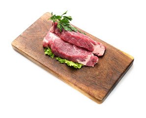 raw steak on a cutting board