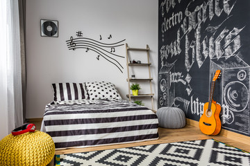Monochrome bedroom for musician