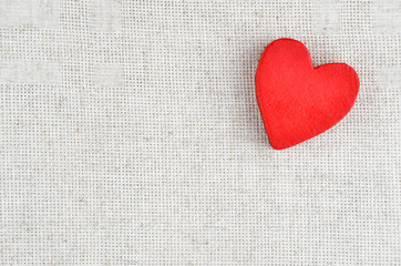 Heart on cloth background