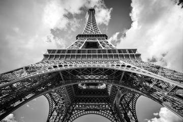 White angle view of the Eiffel tower in Paris, France. Black and white photo. - obrazy, fototapety, plakaty