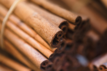 Cinnamon sticks seasoning. An aromatic spice made from the peeled, dried, and rolled bark of a Southeast Asian tree.