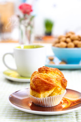 Tasty muffin on breakfast table