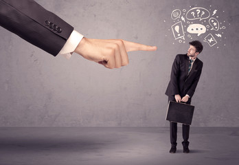 Boss hand pointing at confused employee