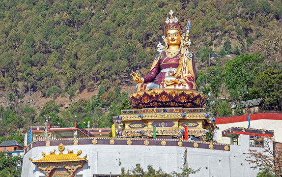  Big golden statue of Padmasambhava at the sacred Rewalsar lake, Himachal Pradesh, India.