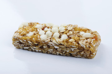Delicious sweet contains a lot of nuts. Horizontal studio shot.