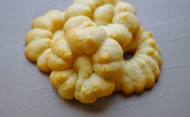 Homemade flower shaped butter cookies made with a cookie press