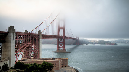 SAN FRANCISCO, CA - August 06, 2014: Thick fog covering Golden Gate Bridge