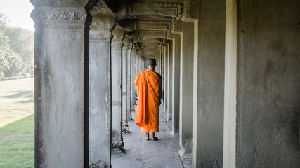 Siem Reap, Cambodia, December 06, 2015: Monk walking at Angkor Wat