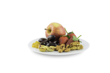 Plate with fruits and nuts in white BG