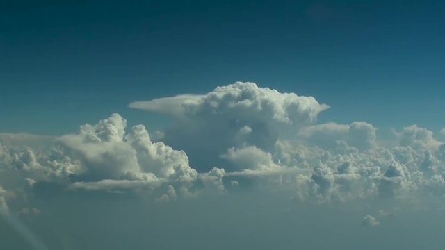 Cumulonimbus clouds on the horizon