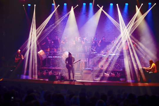 Guitarist performing on stage. Concert.