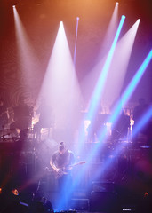 Fototapeta na wymiar Guitarist performing on stage. Concert.