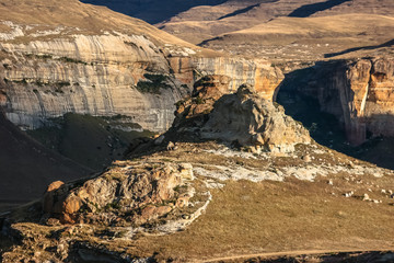 Fototapeta na wymiar Scenic mountains, illuminated by warm late afternoon light, Golden Gate Highlands National Park, South Africa
