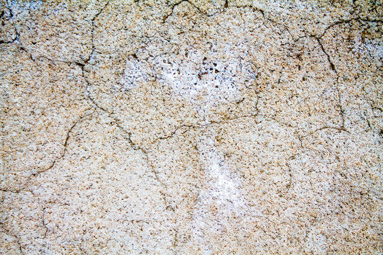 plastered wall as background -  cracks in plaster =  salt on the plaster