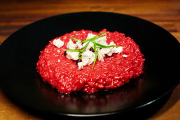 Rice with beetroot, balsamic and cheese.