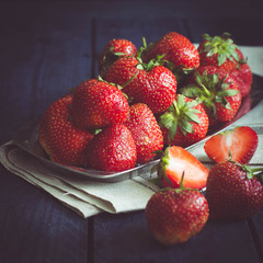 Ripe Strawberries  on dark wooden table background