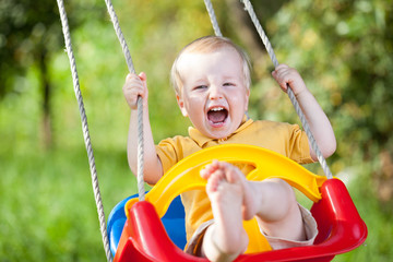 Baby boy having fun