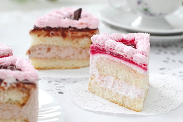 Delicious cake with cream and jelly