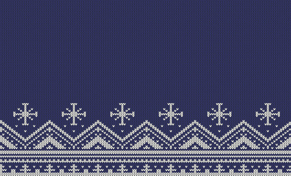 Knitted seamless pattern with stripes, zigzags and snowflakes - white on a dark blue background. Ornament included in swatches  panel.