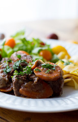 Beef ragout on a white plate 