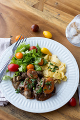 Beef ragout on a white plate 