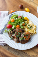 Beef ragout on a white plate 