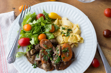 Beef ragout on a white plate 