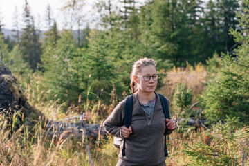 Young woman hiking in forest