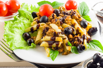 Dish of Italian pasta rigatoni with bolognese sauce