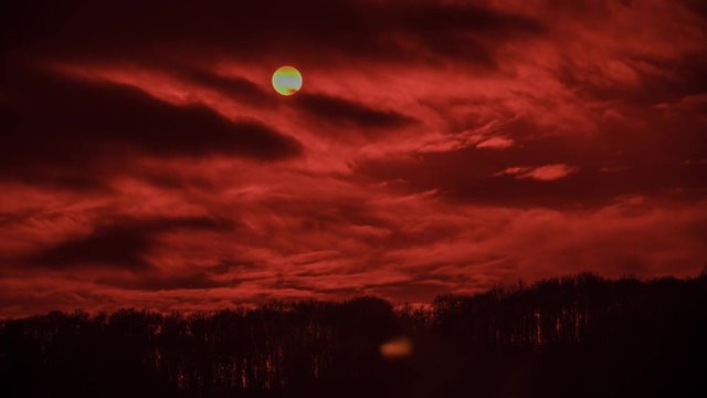 Time-lapse of red sunset filmed with IR filter