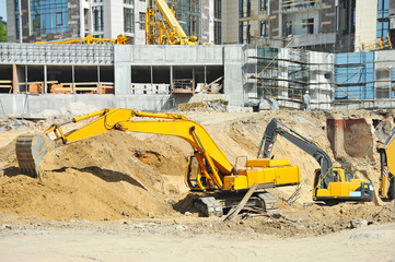 Excavating machine on construction site